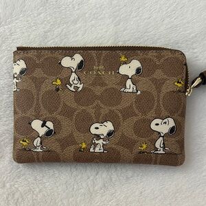 Coach Brown Wristlet with Snoopy and Woodstock